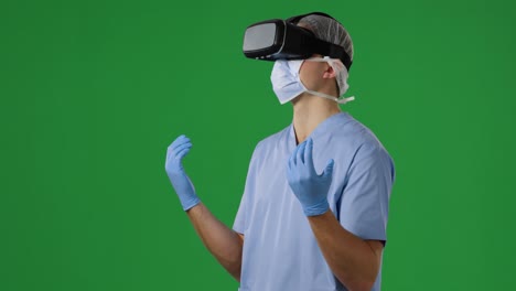 Young-surgeon-in-scrubs-and-VR-headset