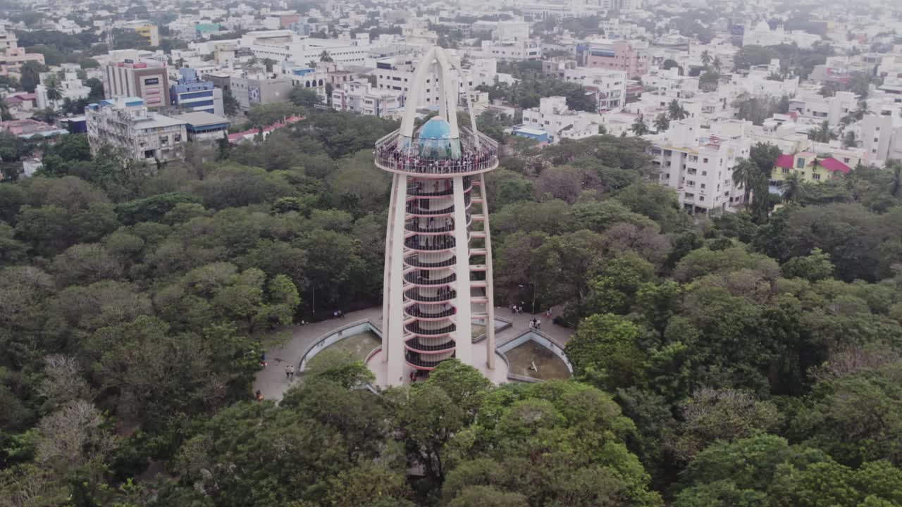 Aerial footage of people visiting the top of Chennai's historic and well-known Anna Nagar Tower