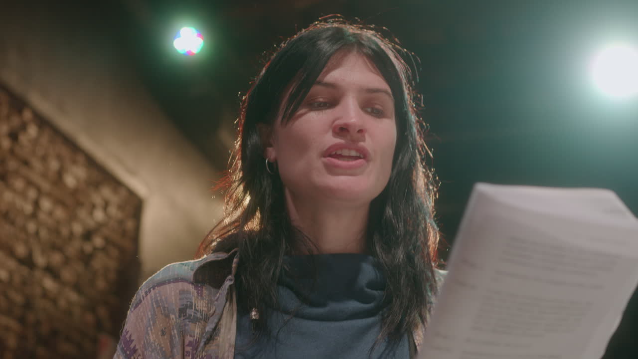Actress Reading Script and Performing Monologue during Rehearsal
