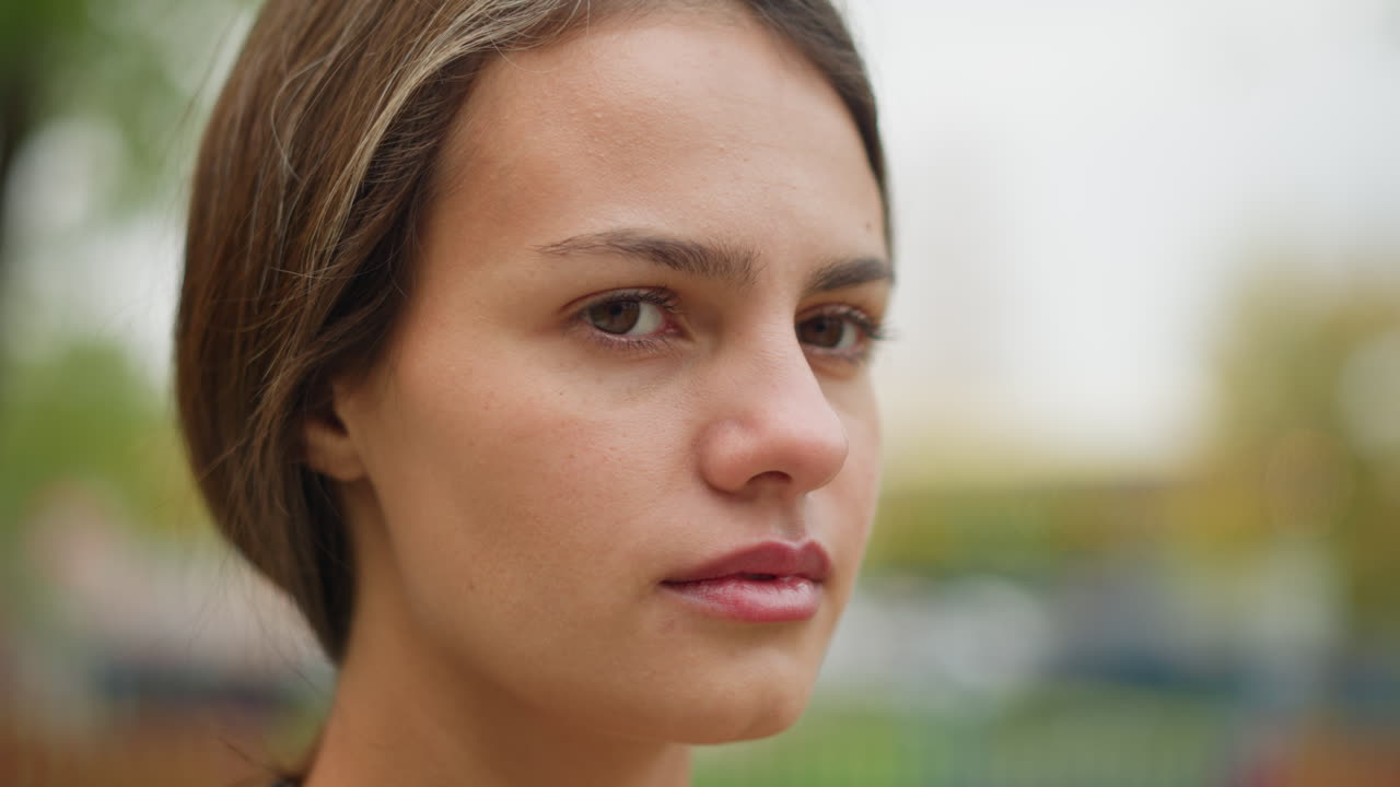 Portrait view of girl turning her face, visible rashes on skin, subtle expression, natural beauty with imperfections, emotional reaction, close-up of face with skin condition, candid moment