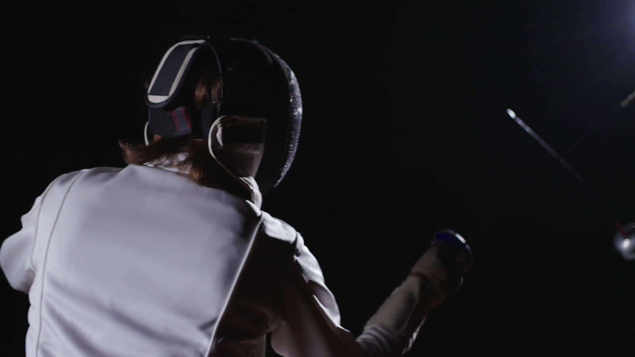 A fencer in action