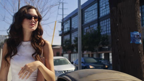 Relaxed-woman-going-on-date-near-modern-buildings.-Asian-lady-rushing-on-meeting