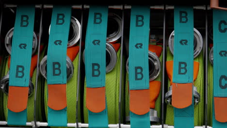 neatly organized fire hoses with b and c labels