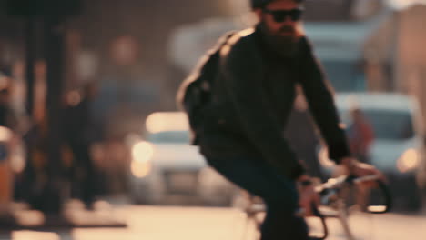 Anonymous-crowd-of-people-walking-cycling-bicycles-commuters-London-City-street-slow-motion