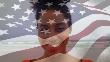 Animation-of-biracial-woman-by-sea-over-flag-of-usa