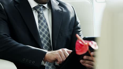 middle eastern business male using wireless tablet technology