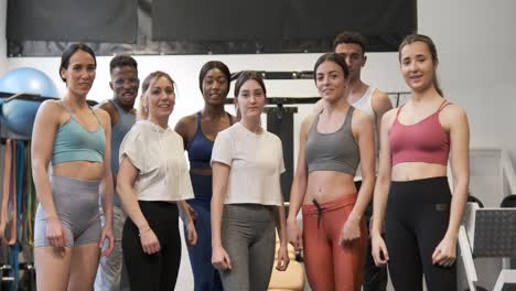 happy fitness group celebrating success