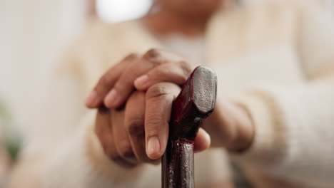 Hands,-walking-stick-and-elderly-person-in-home