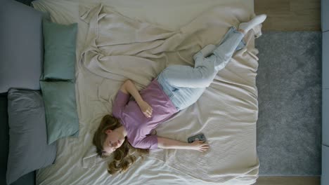 woman relaxing in bed