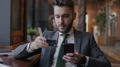 businessman paying bill at cafe