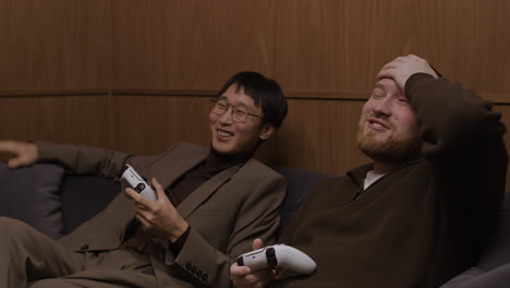 two friends enjoying a video game session