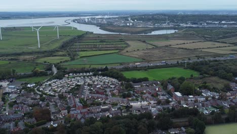 Aerial-view-above-Halton-North-England-Runcorn-Cheshire-motorway-and-countryside-wind-turbines-industry-landscape