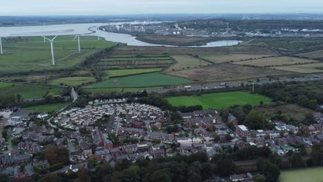 aerial view above halton north england runcorn cheshire motorway and countryside wind turbines industry landscape