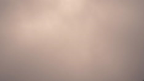 dramatic timelapse of a cloudy valley in gran canaria at sunset. warm golden light breaks through the mist, creating a breathtaking and cinematic scene. perfect for nature, travel, and landscape