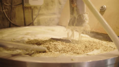 artisanal brewing in montpellier france. cereal grains and water fermenting.