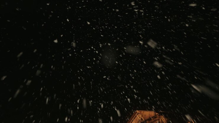 Snowy Night at Wooden Houses