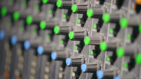 Close-up-isolated-view-of-the-dials-and-knobs-in-a-professional-recording-studio