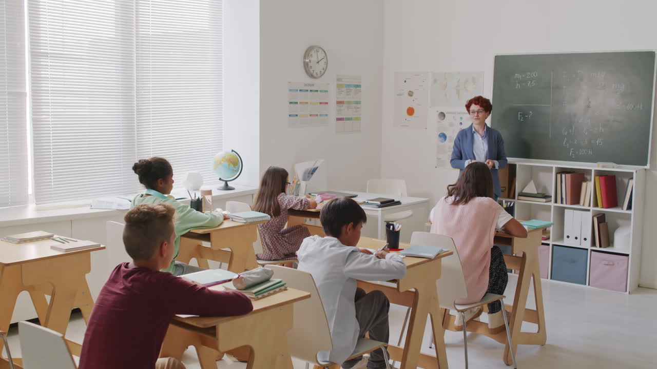Woman Teaching Math in Middle School