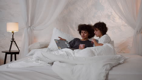 couple watching movie on laptop