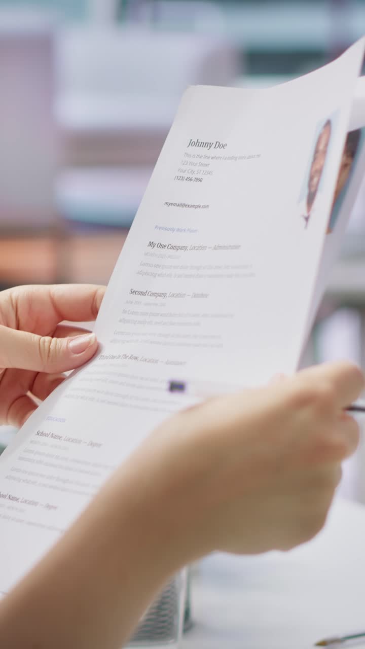 Vertical Video HR employers analyzing candidate CV after the job interview