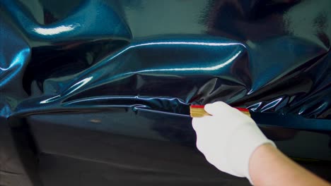 Applying Car Wrap - Dark Teal Vinyl Wrap Installation