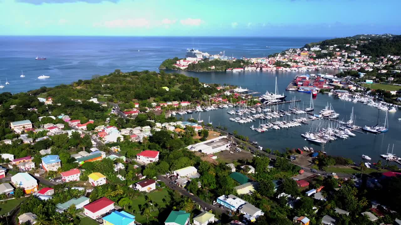Establishing aerial shot of sunny St George houses, boats and cruise ship port
