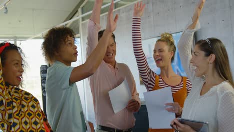 hapiness business people forming hand stack in modern office 4k