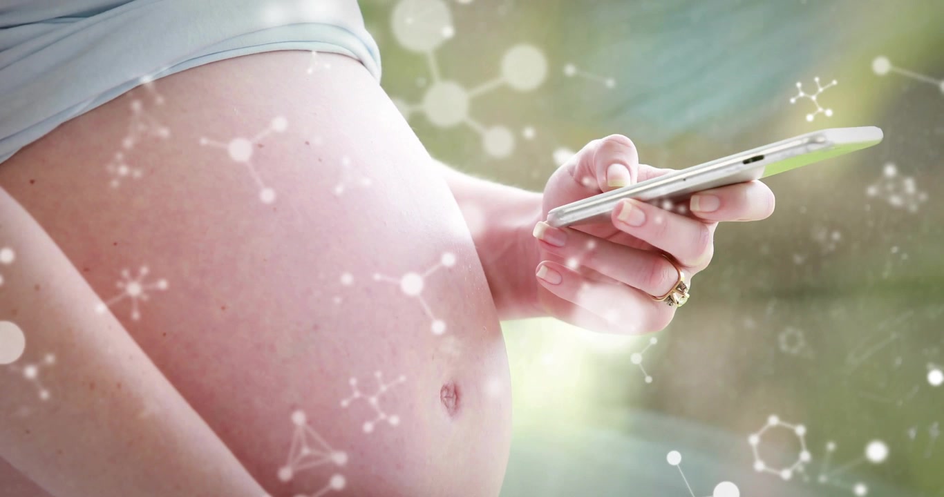 Pregnant woman tapping and tilting phone, cradling belly, showing molecular overlay for health