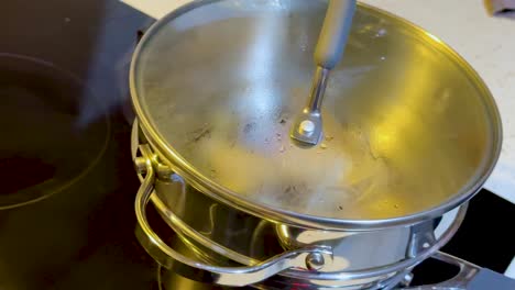 a pot boiling on a stove in australia