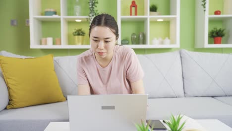 Young-asian-woman-with-anxiety-getting-stressed-at-home.