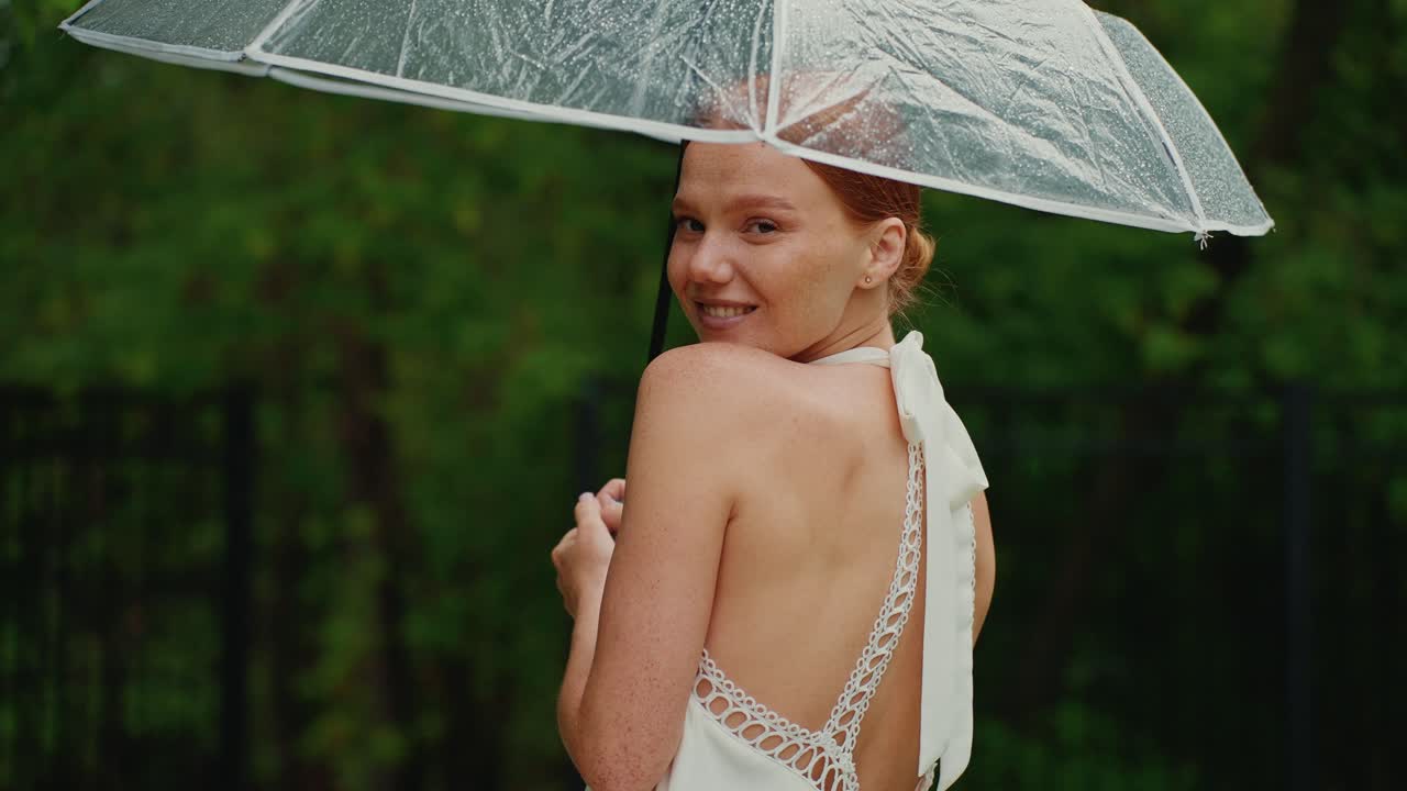 Woman Under Umbrella in the Rain