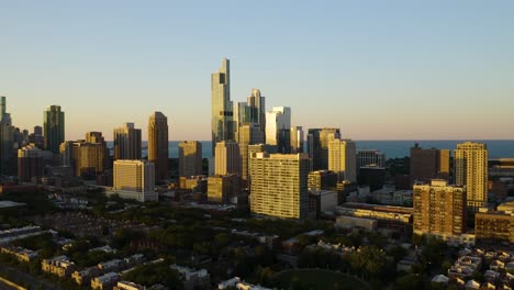 Aerial-Establishing-Shot-of-Skyscrapers-in-Chicago's-South-Loop-at-Sunset