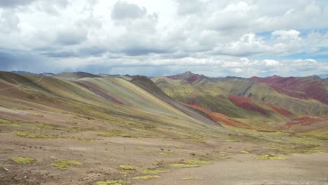 camera pan rainbow mountains, vinicunca, winikunka, red valley in slow motion