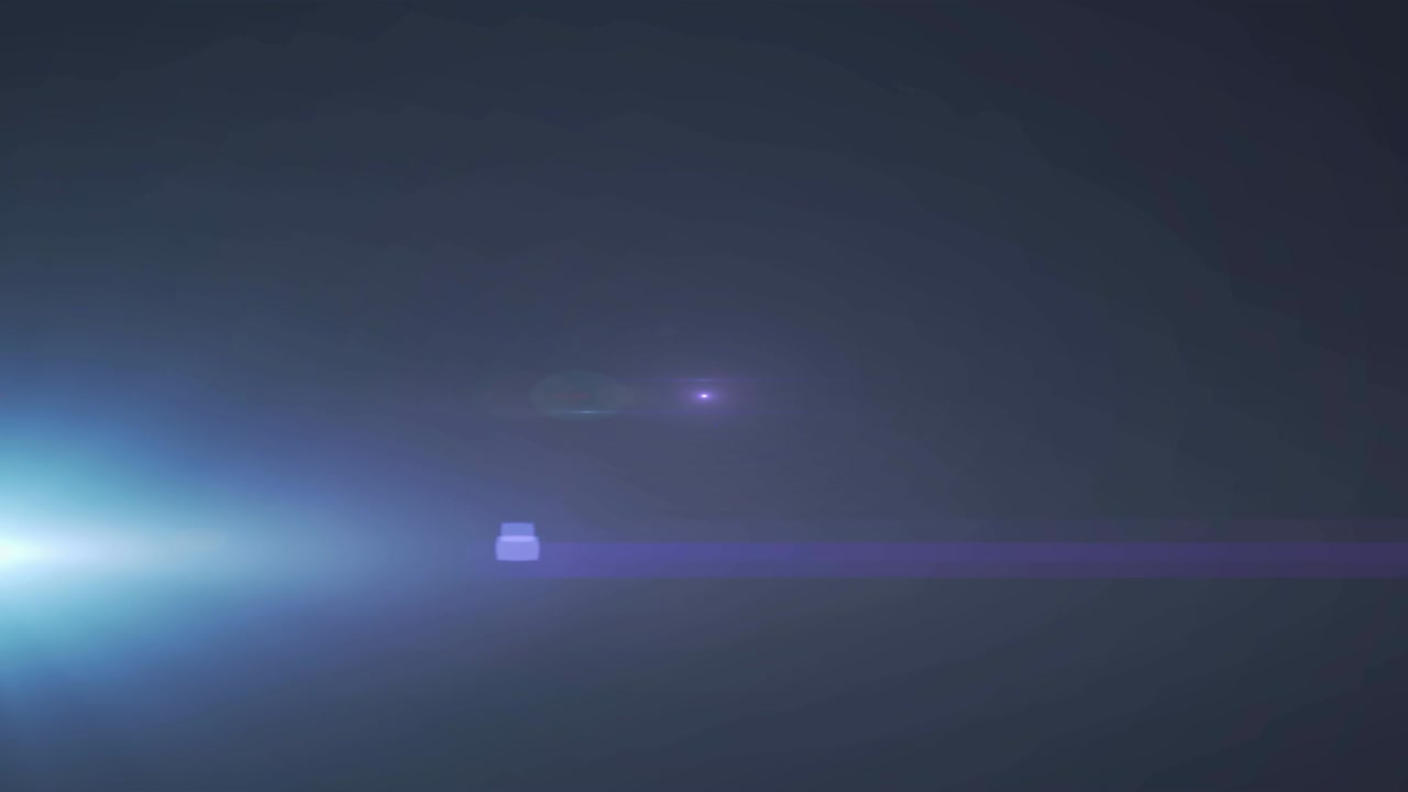 Animation of spotlight with lens flare and light beams moving over dark background