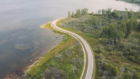 following the bike path along muskegon lake in a film look