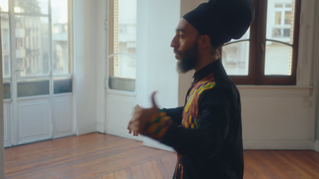Professional Dancer Practicing Tango Leader Technique in Studio