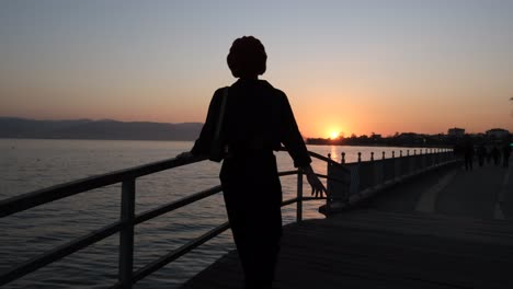 woman sunset strolling