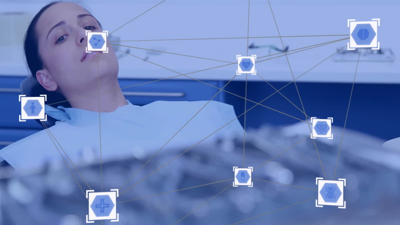 Animation of network of connections with icons over caucasian female patient in dental office