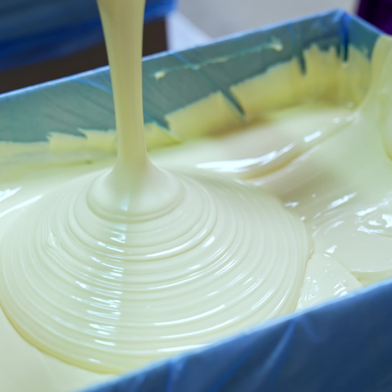 Factory cheese making in big production industry. Huge factory milk tanks for producing butter