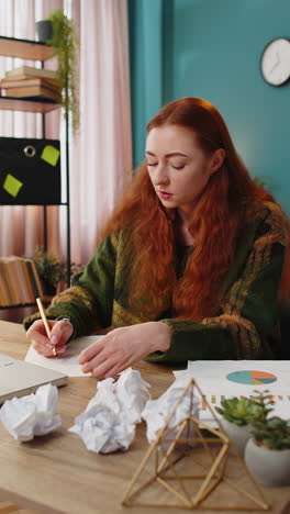 angry furious businesswoman throwing crumpled paper nervous breakdown at office work losing temper