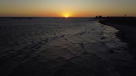 Drone-shot-of-Sunset-at-Port-Macdonnel,-South-Australia,-over-the-Southern-Ocean