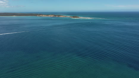 Slow-aerial-flight-across-bay-toward-Fort-Nepean,-Pt-Lonsdale,-AUS