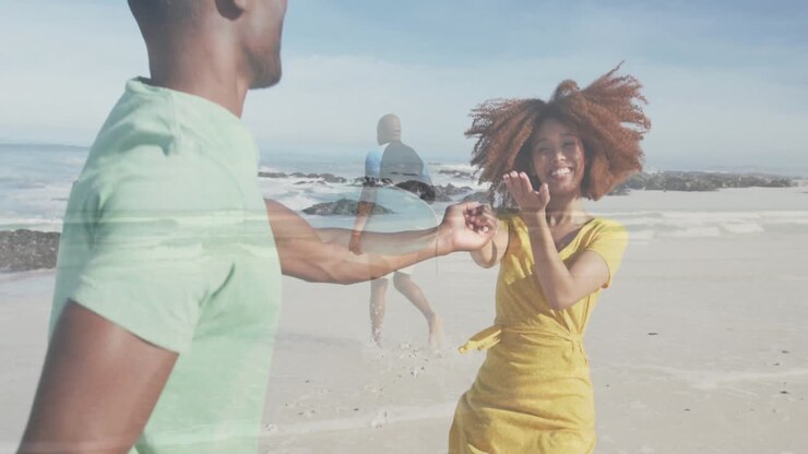 three friends dancing on sandy beach by rocky shoreline, showing tourism graph and wave icons