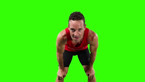 atleta agotado en la pantalla verde