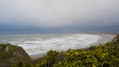 stormy beach view from clifftop