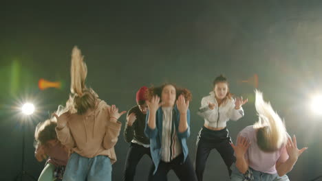 teenagers performing a dynamic dance routine