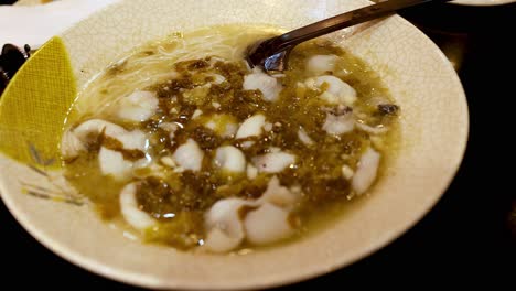 delicious ramen soup with fish and vegetables