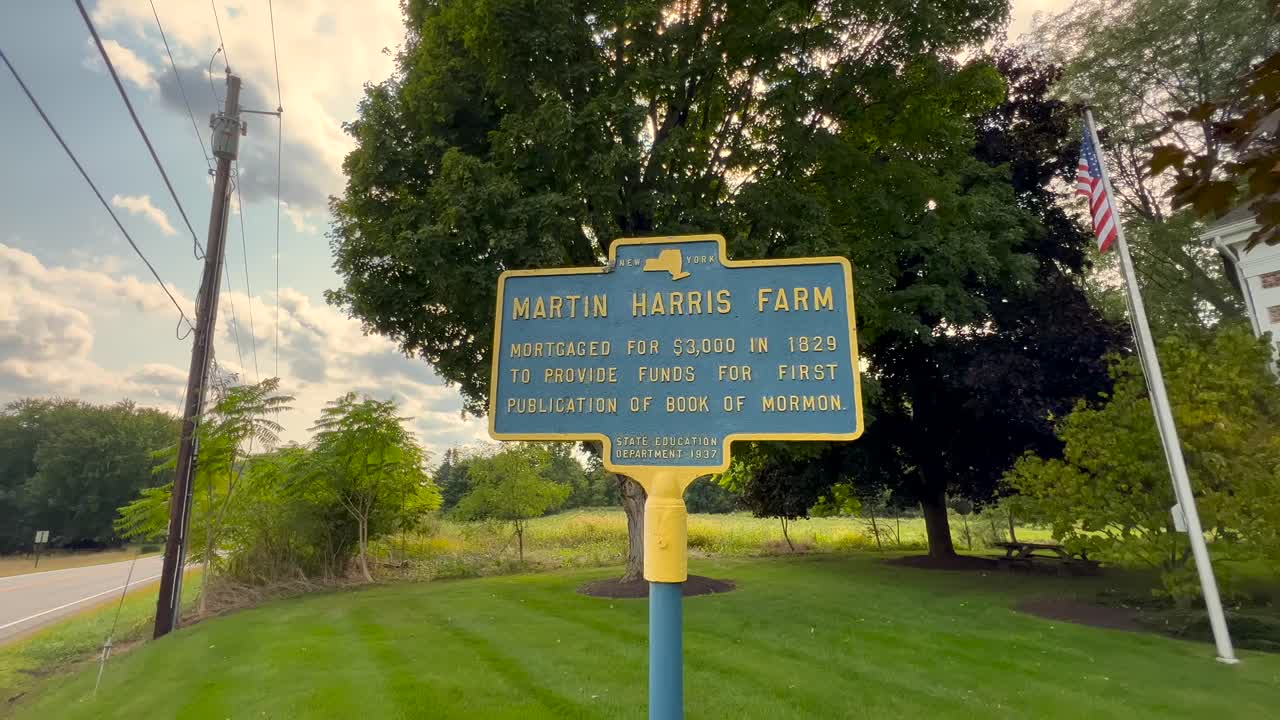 Slow push to the landmark sign at Martin Harris&rsquo; home historic shot near Downtown Palmyra New York