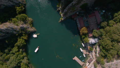 top view of circling drone over river in matka canyon