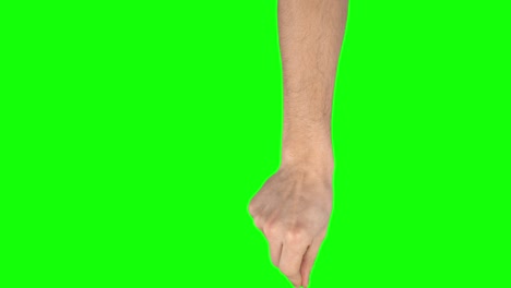 man hand is performing double swipe down at tablet screen gesture on green screen. close up